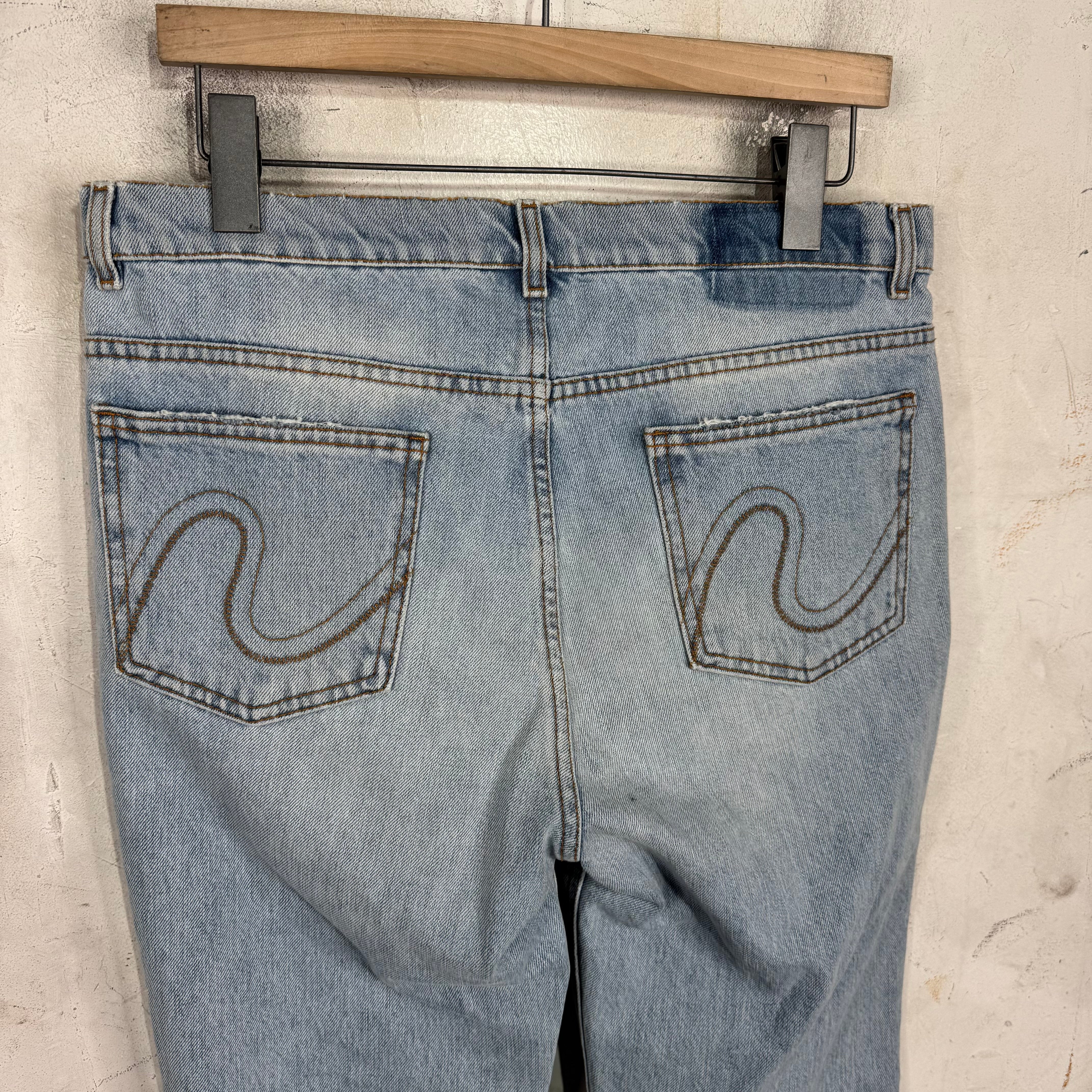 ERL Lightwash Distressed Bootcut Jeans - Image 9