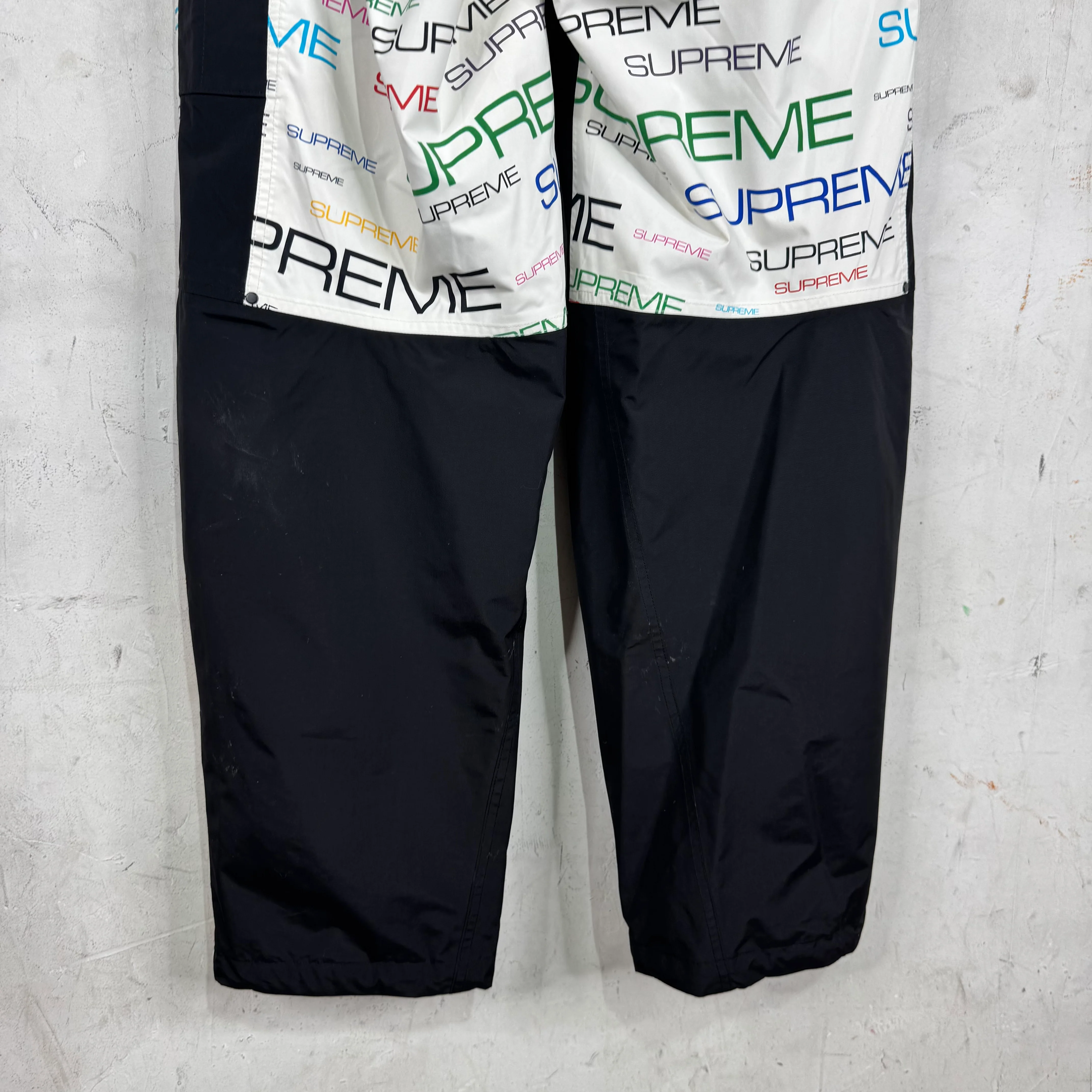 Supreme x TNF Multicolor Script Shell Pants - Image 11